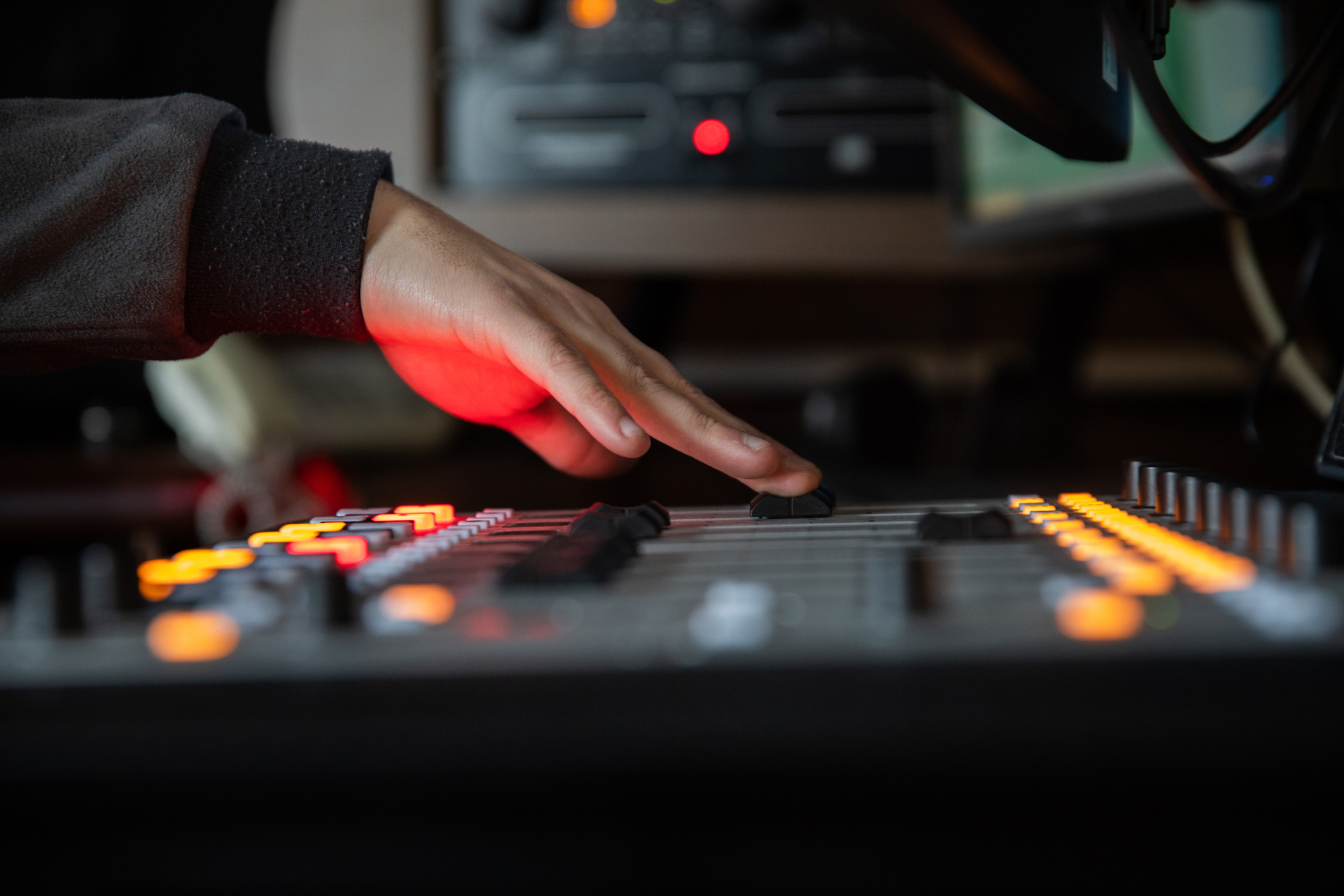 Hand on DJ decks